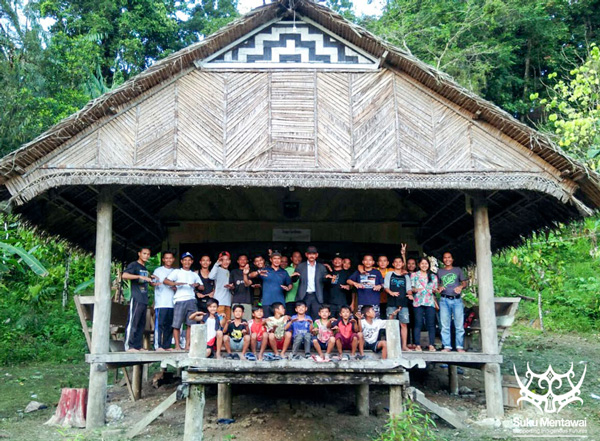Suku Mentawai Education Foundation gather together with the local community to support their cultural education program