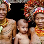 Portrait of a Mentawai shaman, Sikerei, and his family